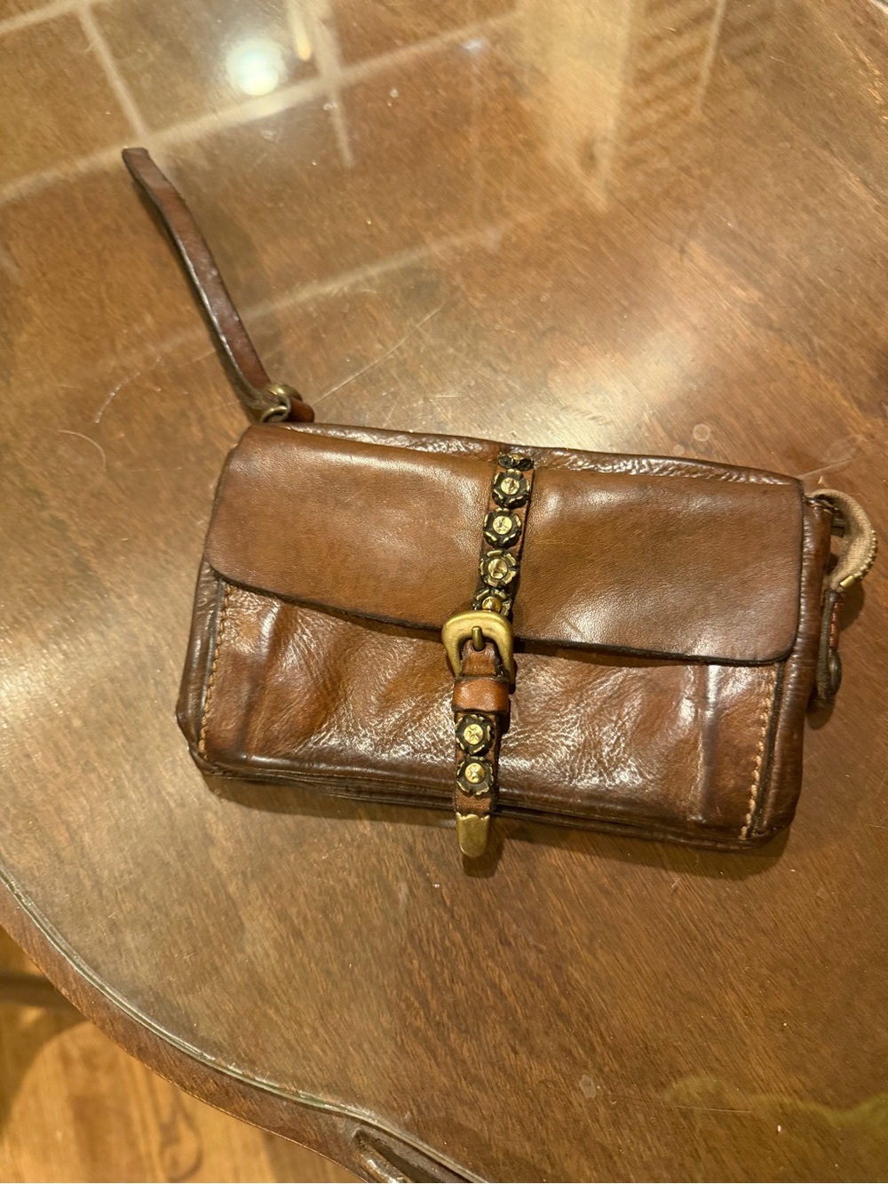 Campomaggi brown leather wallet with floral nail detail